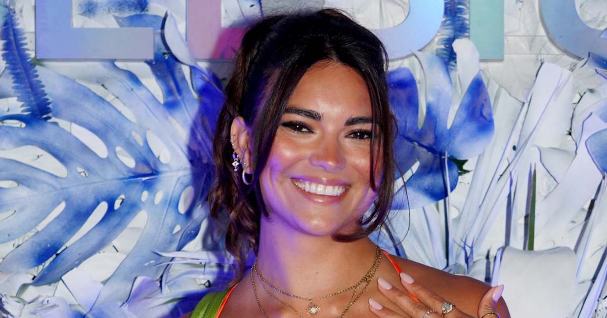 Kyra Santoro Embraces Winter Whites in Her Marvelous Backless Mini