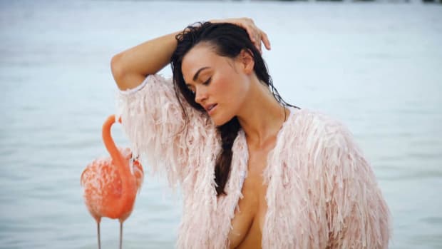 Myla Dalbesio shoots with some fun feathered models