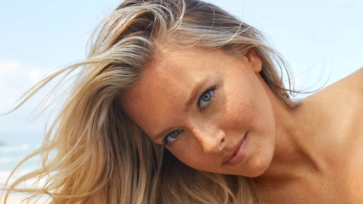 Model Camille Kostek poses for the 2022 Sports Illustrated