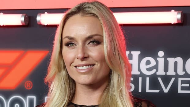 Lindsey Vonn wears her blonde hair down and smiles for the camera.