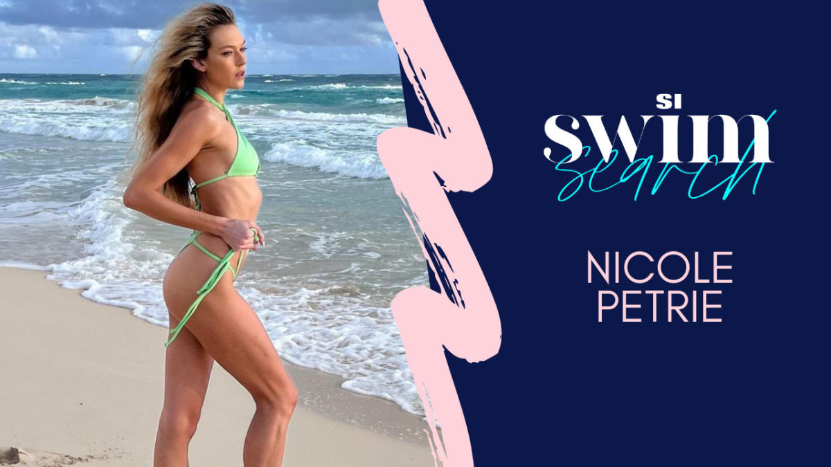 SI swimsuit model Nicole Petrie puts boobs on full display in eye
