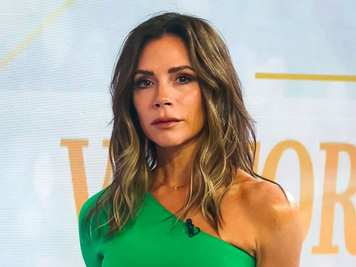 Victoria Beckham Puts Abs on Display in Blue Cut Out Swimsuit