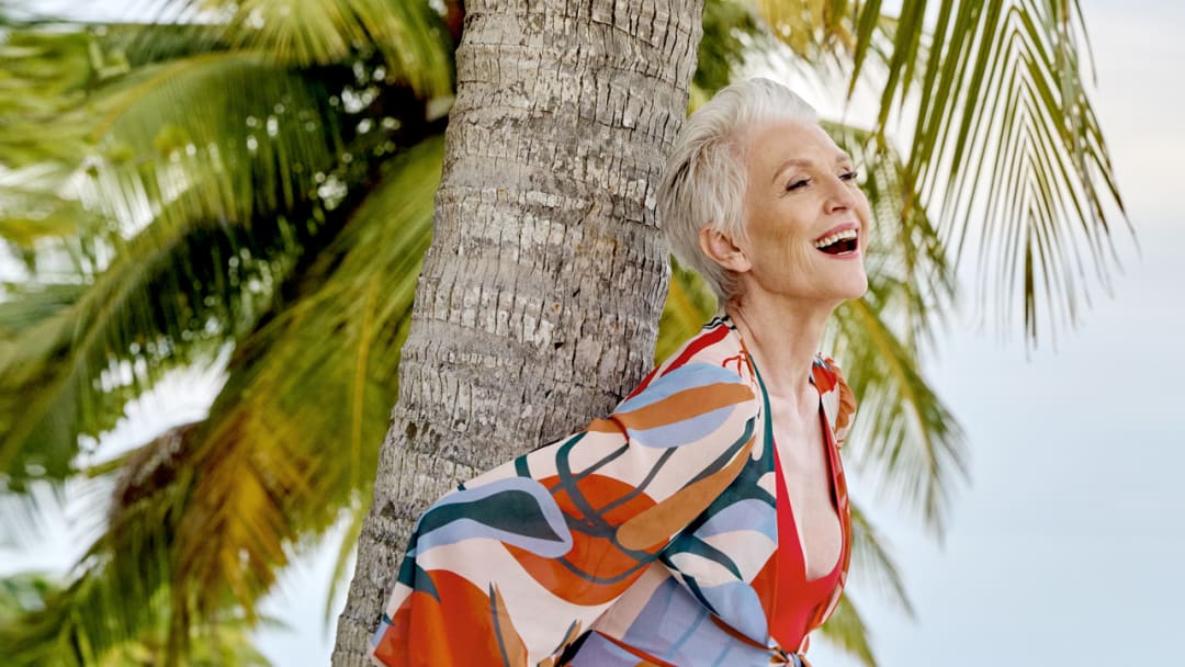 Maye Musk was photographed by Yu Tsai in Belize. Swimsuit by Cali Dreaming. Coverup by PatBo.