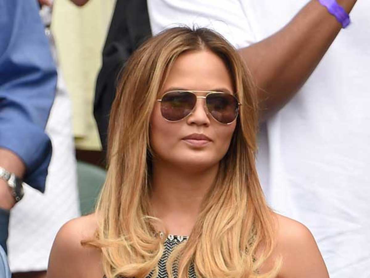 sideboob Chrissy Teigen's sideboob steals the spotlight at Centre Court