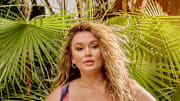 Hunter McGrady was photographed by Yu Tsai in Belize. Swimsuit by Mara Hoffman. Earrings by SENIA.