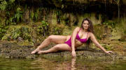 Natalie Mariduena was photographed by Yu Tsai in Belize. Swimsuit by Divine Feminine Intimates. Earrings by Viktoria Hayman.