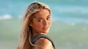 Olivia Dunne was photographed by Ben Watts in Puerto Rico. Swimsuit by Entire Studios.