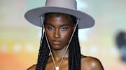A model walks the runway for Island Tribe Swimwear at PARAISO Miami Beach for Miami Swim Week 2022.