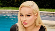 Kim Petras was photographed by Yu Tsai in Los Angeles. Swimsuit by LILY&ROSE. Earring by Jennifer Meyer.