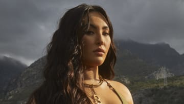 Yumi Nu was photographed by James Macari in Montenegro.  Swimsuit by Ola Vida. Necklace by Michelle Ross.