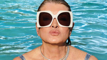 Martha Stewart was photographed by Ruven Afanador in the Dominican Republic. Sunglasses by Gucci provided by Moda Operandi. Necklace by Cicada.