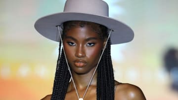 A model walks the runway for Island Tribe Swimwear at PARAISO Miami Beach for Miami Swim Week 2022.