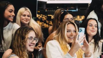 Camille Kostek and UCF students at the Maybelline beauty bar.