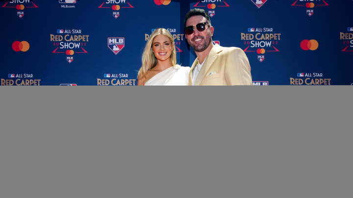 Kate Upton and husband Justin Verlander of the Houston Astros pose for a photo with their daughter during the All-Star Red Carpet Show at L.A. Live on Tuesday, July 19, 2022 in Los Angeles, California. 