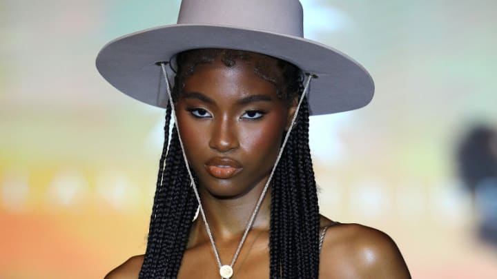 A model walks the runway for Island Tribe Swimwear at PARAISO Miami Beach for Miami Swim Week 2022.