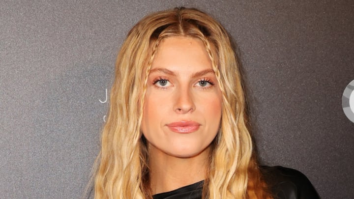 Xandra Pohl poses in a black silk dress and sports her blonde hair in a soft wave. Xandra Pohl poses in a black silk dress and sports her blonde hair in a soft wave.