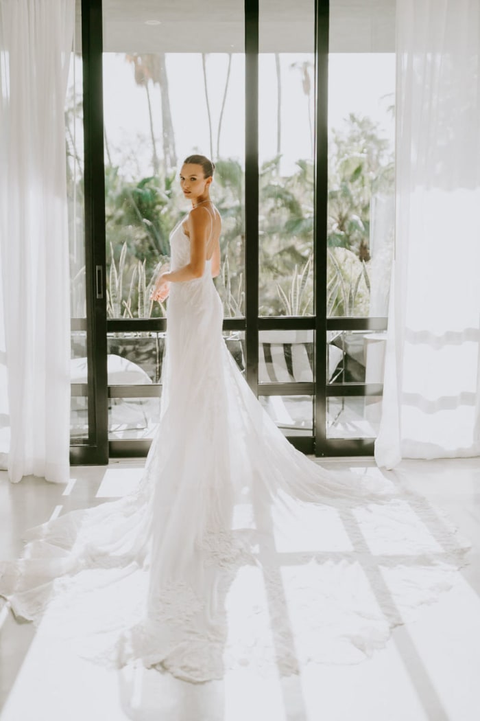 The bride, wearing custom Alberta Ferretti