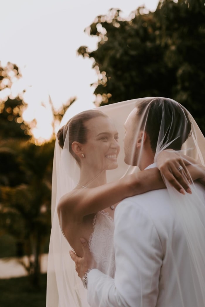 Josephine Skriver and Alexander embrace after the ceremony