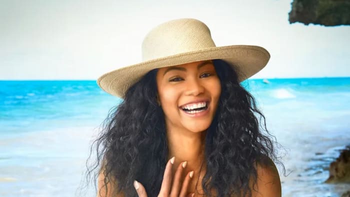 The Story Behind the Famous SI Swim Photo of Chanel Iman Charming a ...