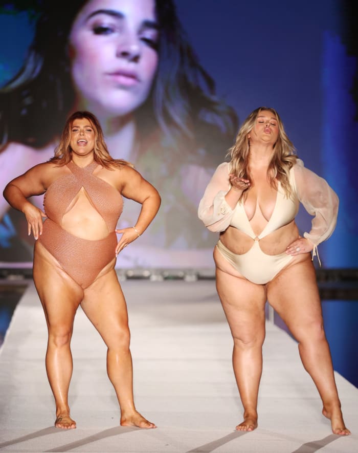 Michaela McGrady and Hunter McGrady walk the runway for Sports Illustrated Swimsuit Runway Show During Paraiso Miami Beach on July 16, 2022 in Miami Beach, Florida.