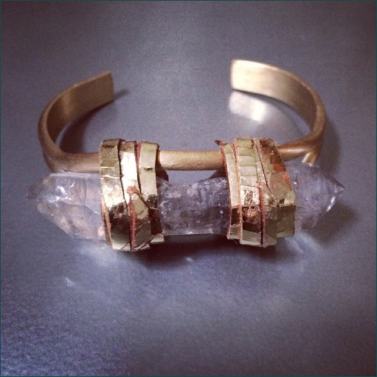 Single Flame Cuff with Tibetan quartz crystal