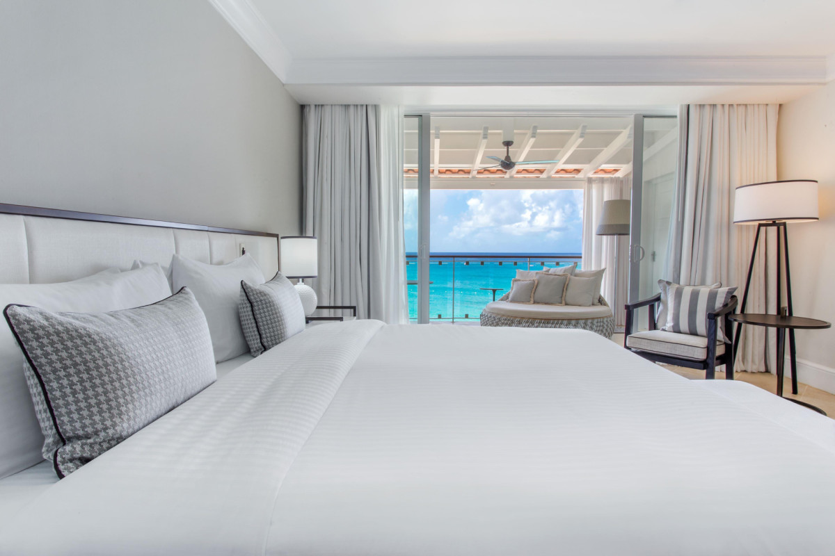 Stretch out on your king size bed and feel the breeze from the ocean. Fairmont Royal Pavilion