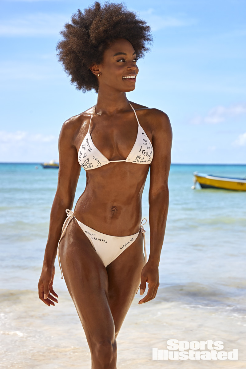 Tanaye White was photographed by Ben Watts in Barbados.Swimsuit by BabenEarrings by Baublebar