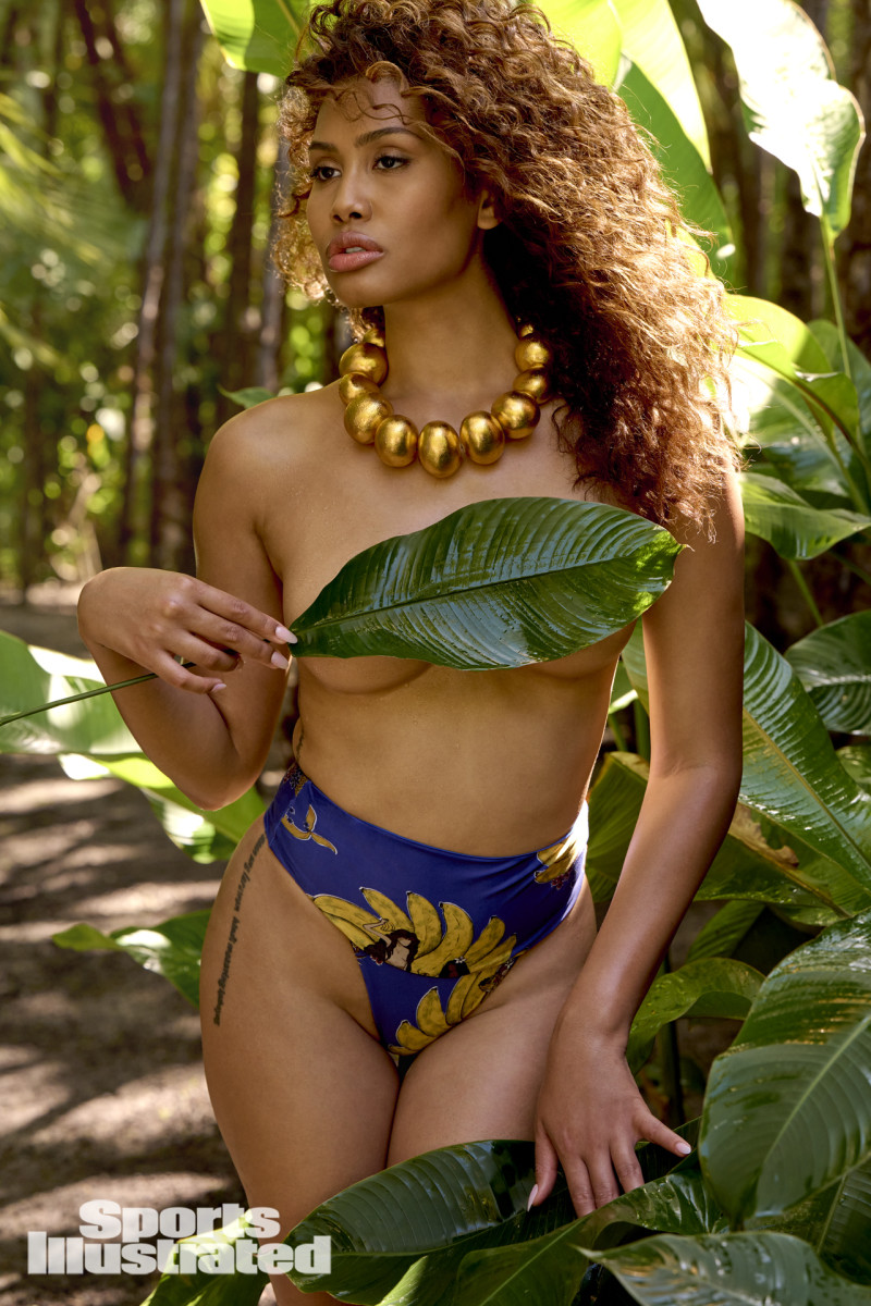 Leyna Bloom was photographed by Yu Tsai in Belize. Swimsuit by Farm Rio. Necklace by Viktoria Hayman.