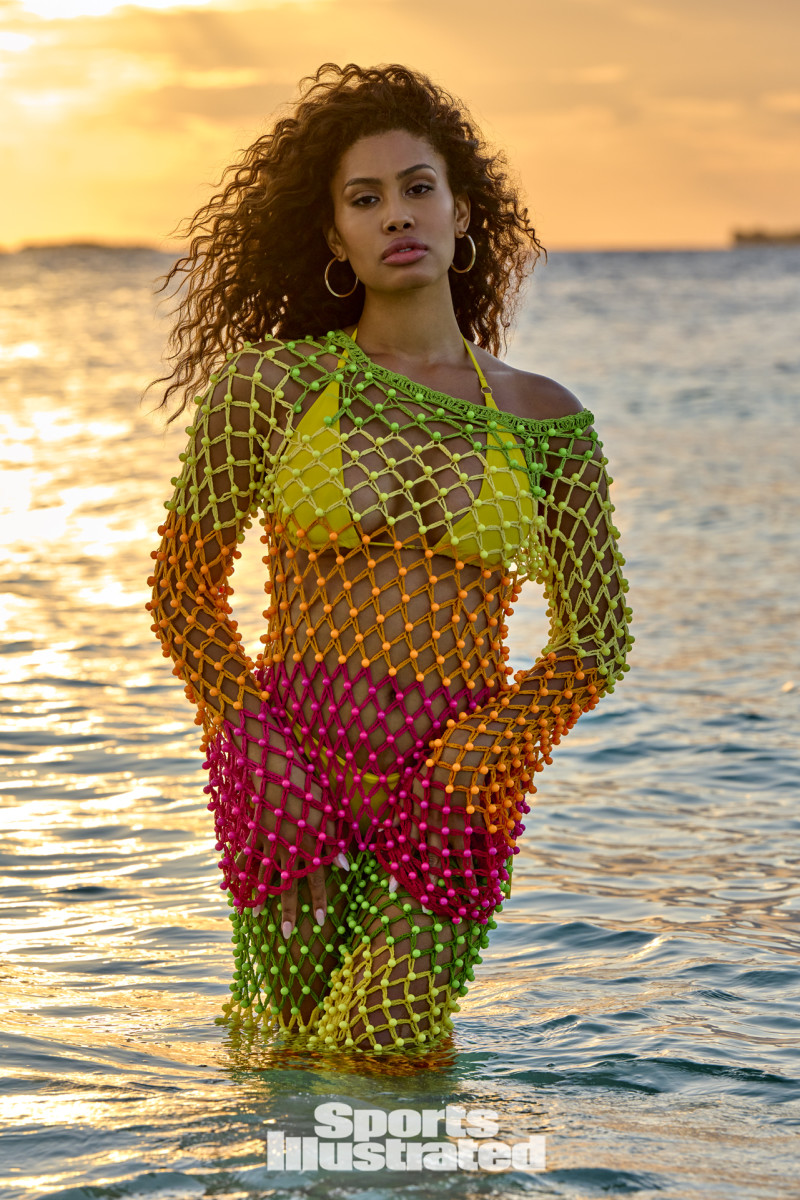 Leyna Bloom was photographed by Yu Tsai in Belize. Swimsuit by Navy Ray. Dress by Celia B. Earrings by 8 Other Reasons.