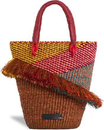 The multicolored woven raffia with winding ruffles and sleek leather accents is a unique style that will elevate any ensemble.