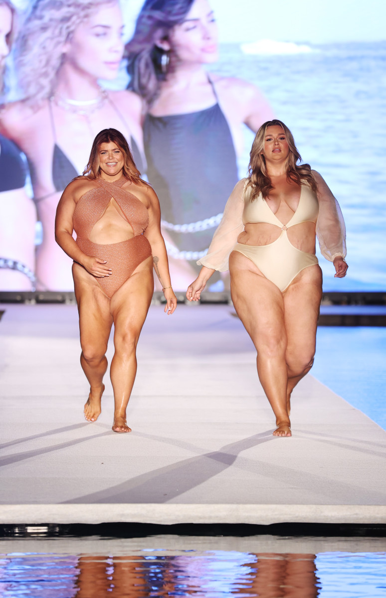 Michaela McGrady walks the runway for Sports Illustrated Swimsuit Runway Show with sister Hunter McGrady during Paraiso Miami Beach on July 16, 2022 in Miami Beach, Florida.