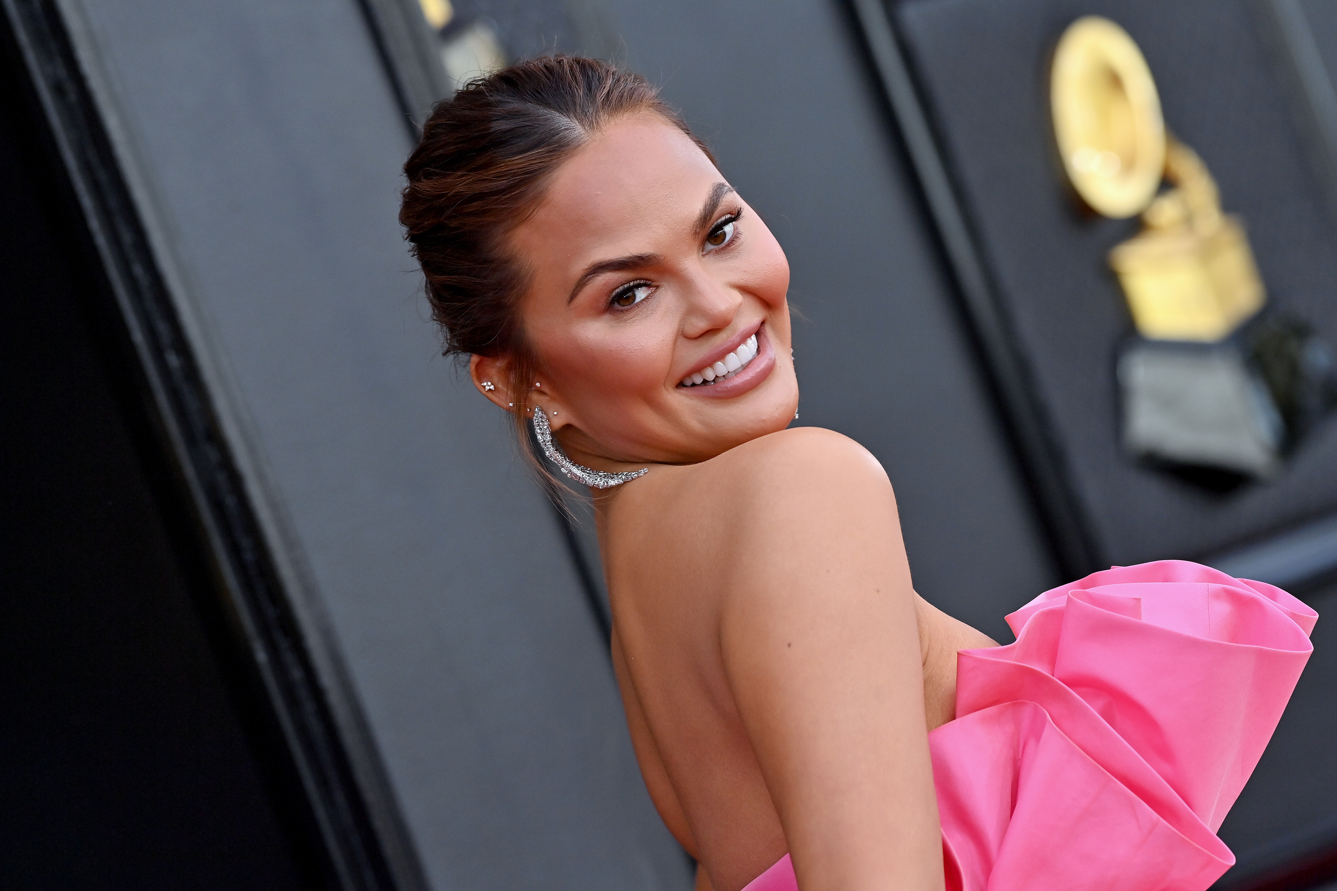 Chrissy Teigen's Movie Ranks in Netflix's Top 10 - Swimsuit | SI.com