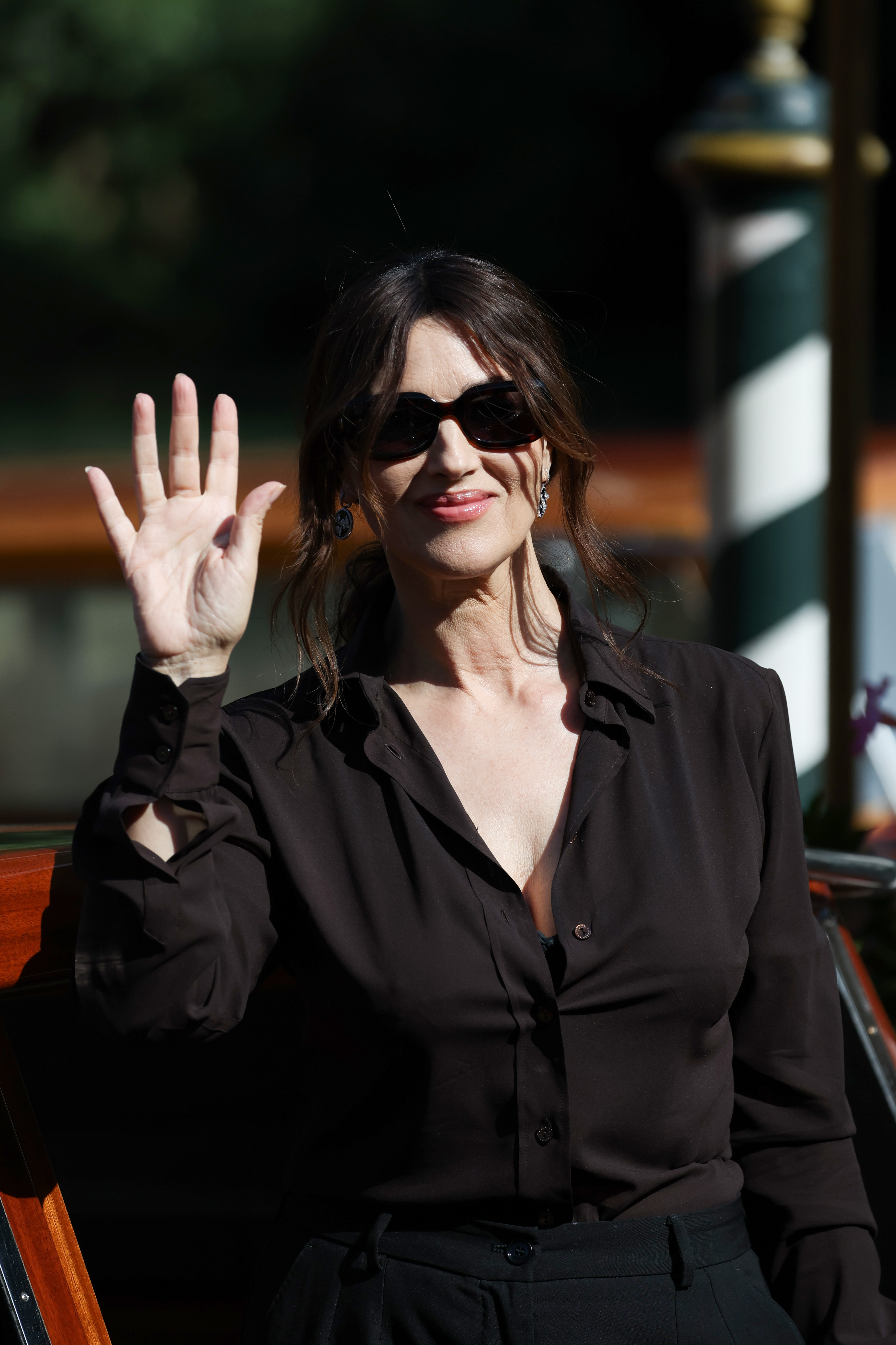 Monica Bellucci leaves the Hotel Excelsior during the 79th Venice International Film Festival.