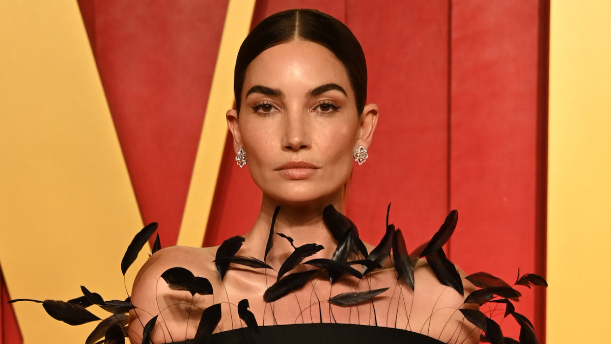 Lily Aldridge Looks Ethereal in Her Unique Black Figure-Hugging Gown at the  Oscars - Swimsuit