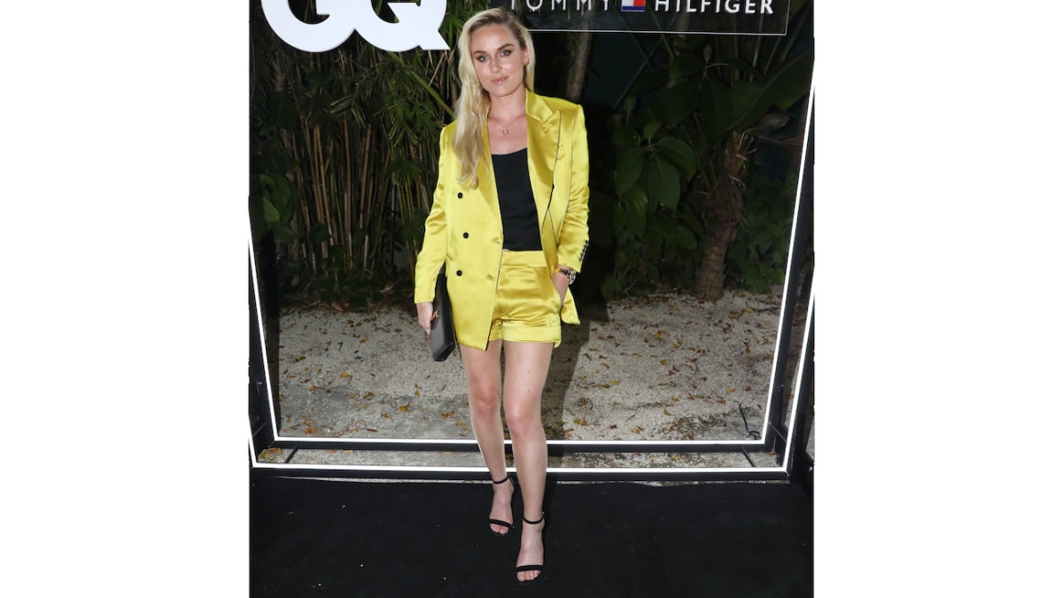 Lindsey Vonn poses in a green silk blazer and short set.