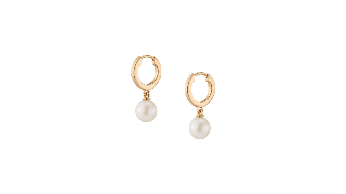 One of The Best Jewelry Gifts for the 2023 Holiday Season Earring Edition, the Aurate Pearl Huggie Earrings available now at Aurate New York